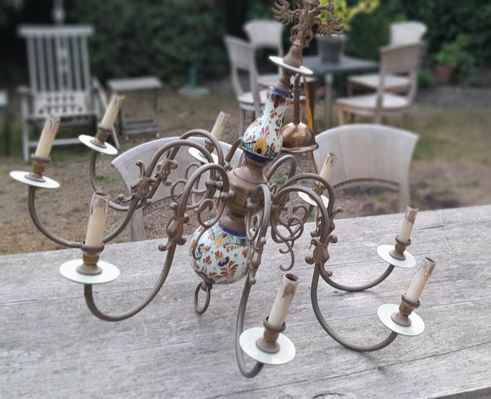8 arms kroonluchter met porselein., Ophalen