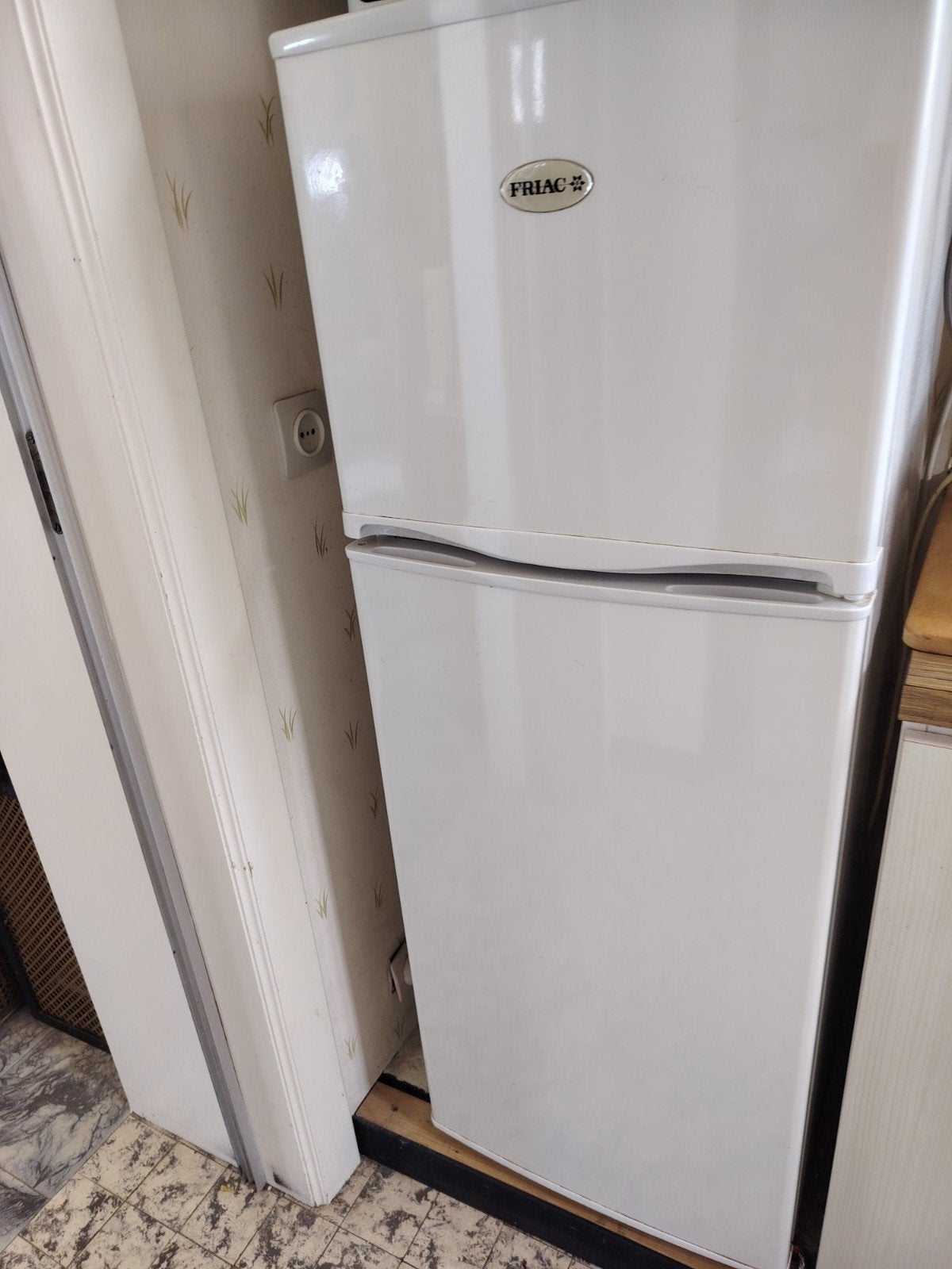 Frigo met diepvriezer, Ophalen