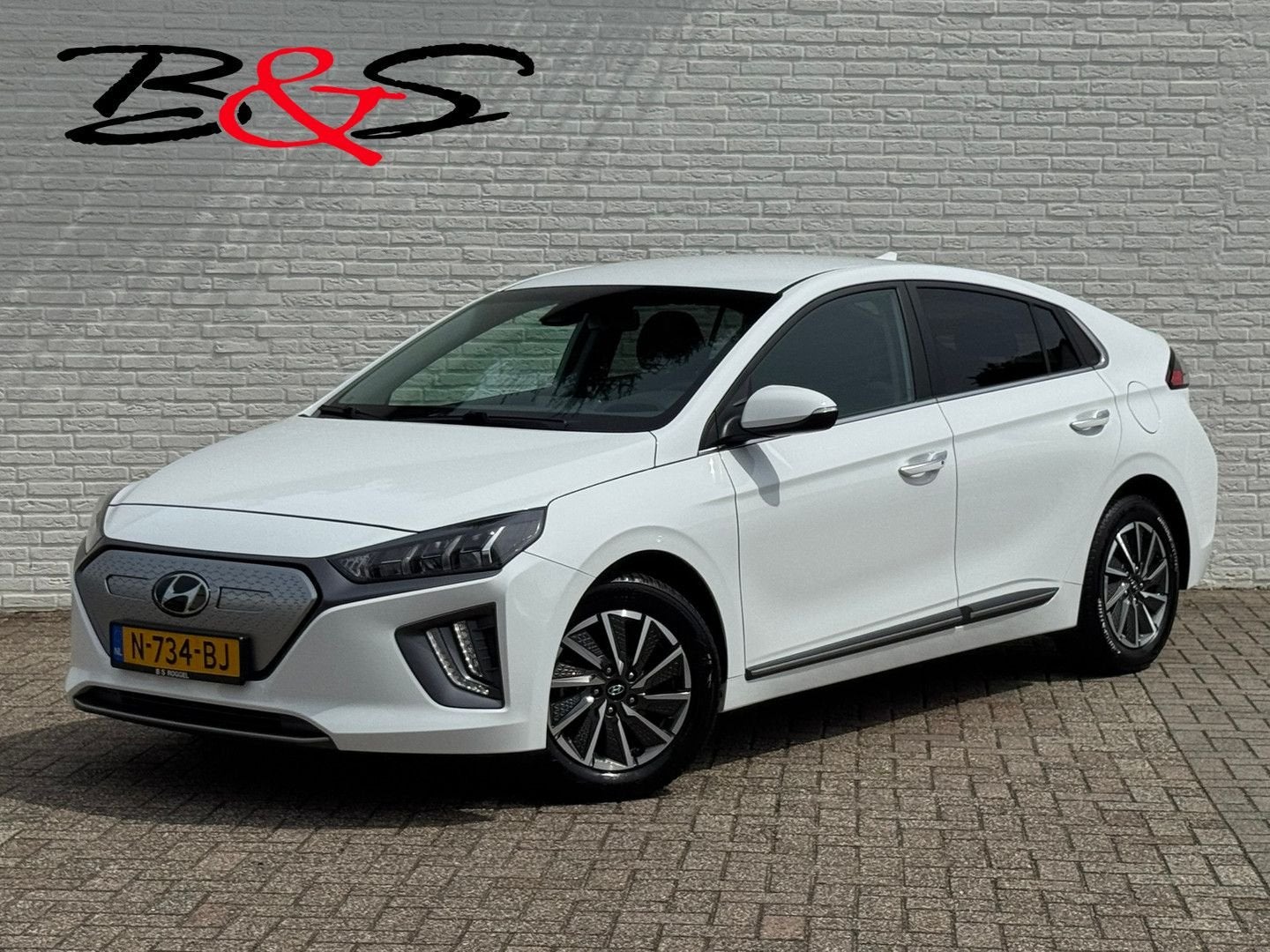 Hyundai IONIQ Comfort EV 38 kWh +300km rijbereik Camera Navi, Auto's, Automaat, Wit, Grijs, Electronic Stability Program (ESP)