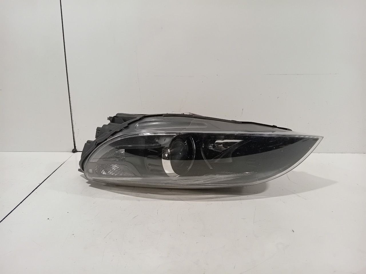 Koplamp links Volvo V40, Onderdelen@venauto.nl, Van der Ven Autorecycling B.V., Gebruikt, Ettenseweg 76, 4706 PB Roosendaal, The Netherlands