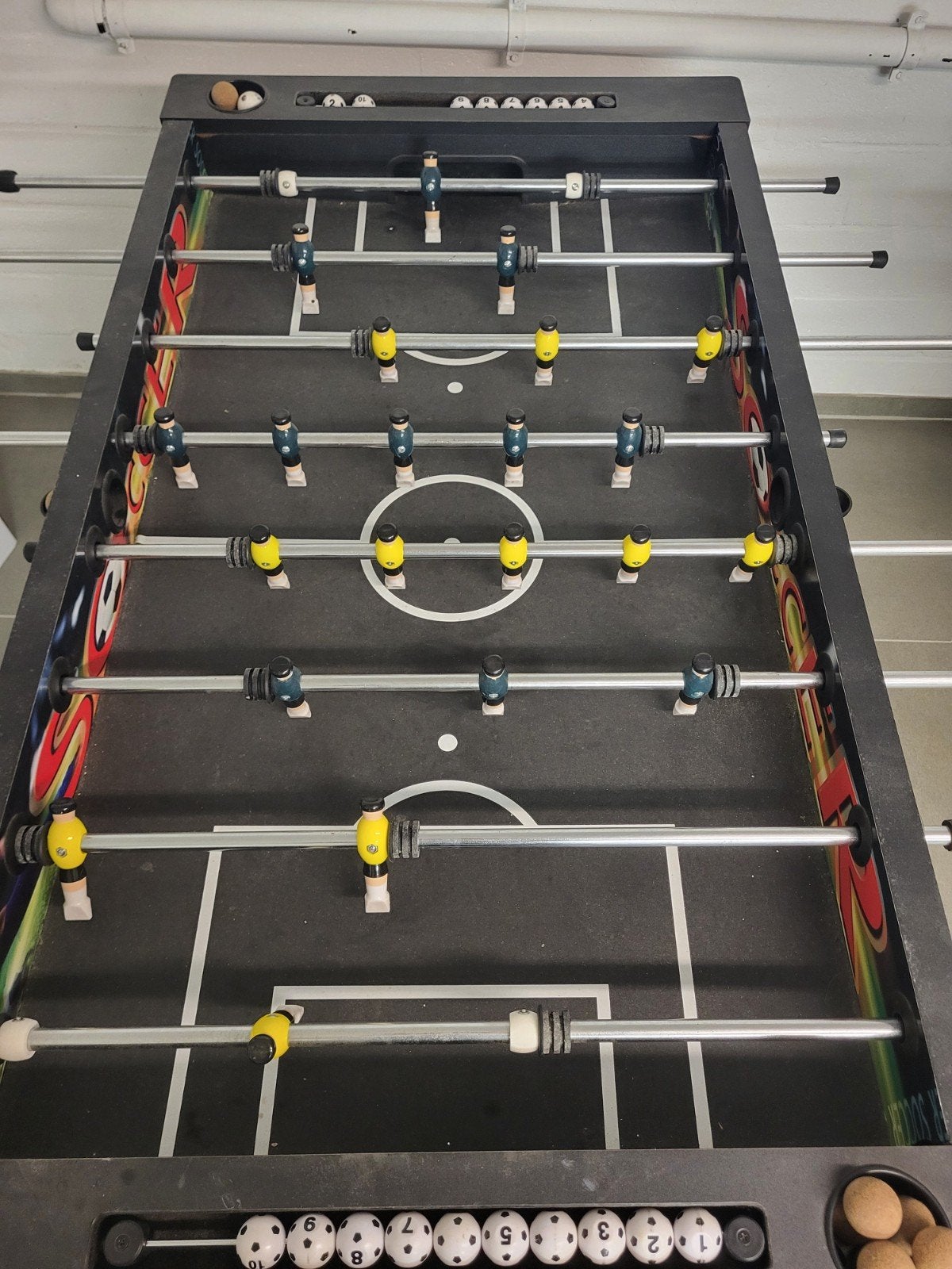 Voetbaltafel, Ophalen