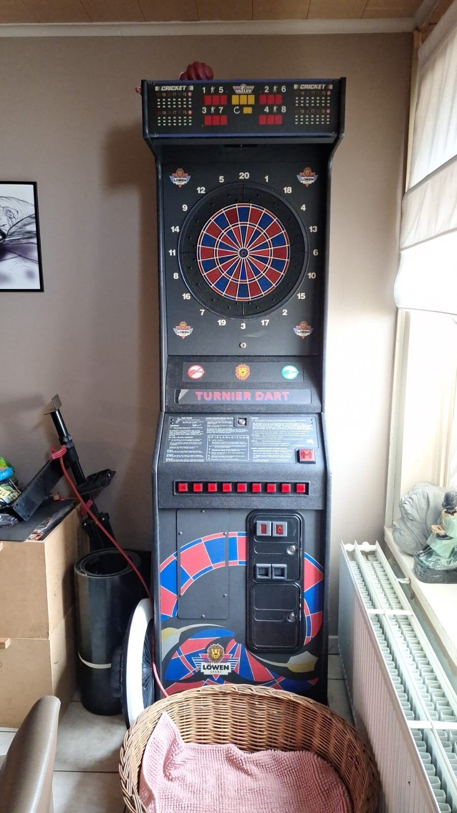 Electronische dartskast, Ophalen