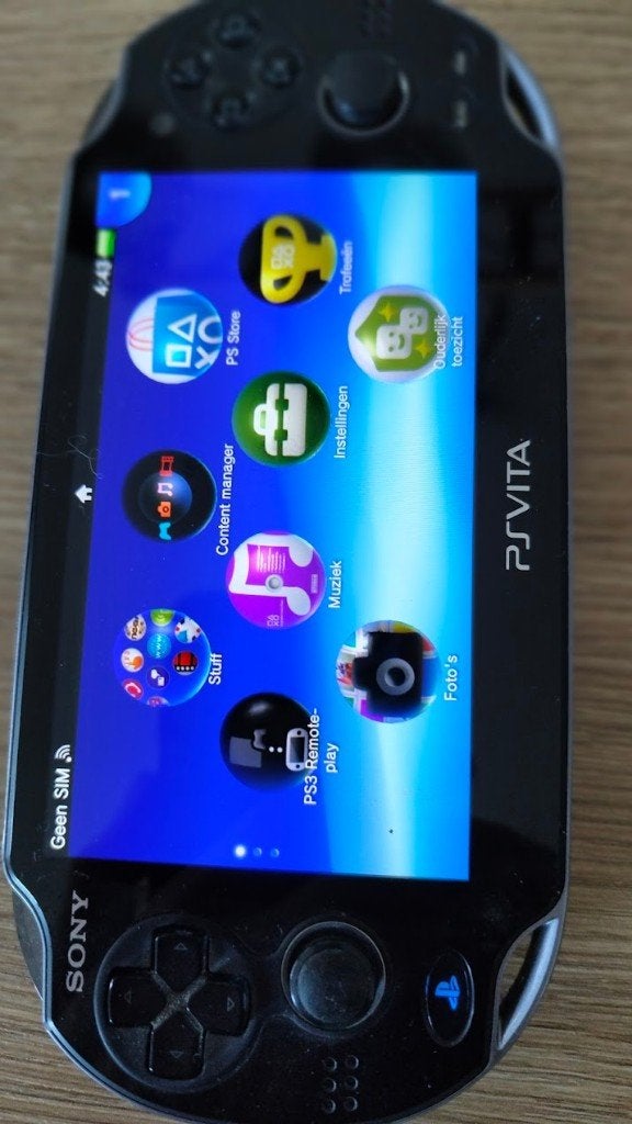 Sony PS Vita OLED, Games en Spelcomputers, Spelcomputers | Sony PlayStation Vita, Ophalen of Verzenden, Zo goed als nieuw, Zwart