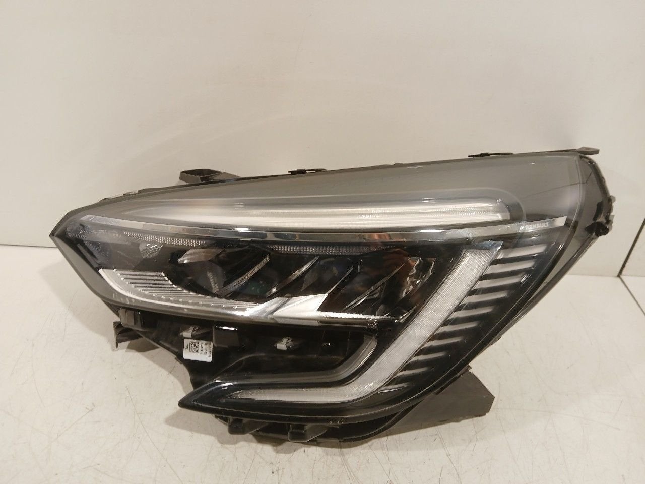 Koplamp links Renault Clio, Onderdelen@venauto.nl, Van der Ven Autorecycling B.V., Gebruikt, Ettenseweg 76, 4706 PB Roosendaal, The Netherlands
