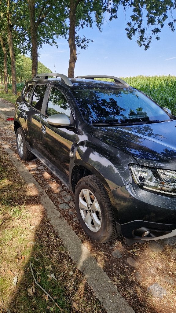 Dacia Duster 1.0 TCe Comfort *4Nieuwe 4s banden*, Auto's, Voorwielaandrijving, Stof, Duster, 5 deurs