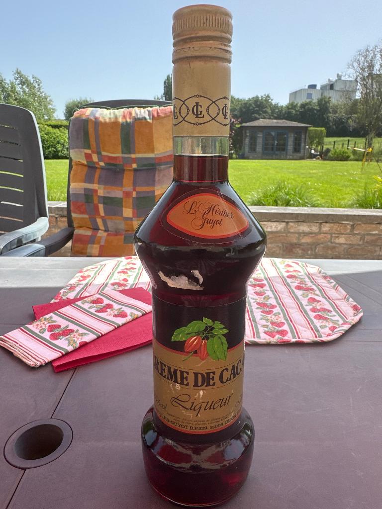 Bouteille vintage Liqueur de cacao L'heritier Guyot, Collections, Vins, Enlèvement ou Envoi, Neuf, Pleine