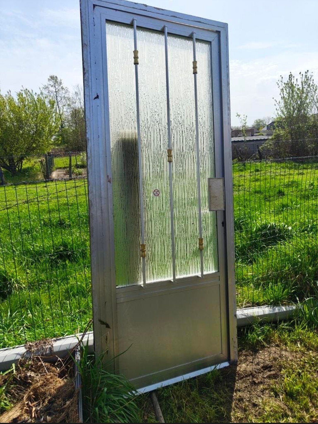 Porte en aluminium vitrée, Enlèvement