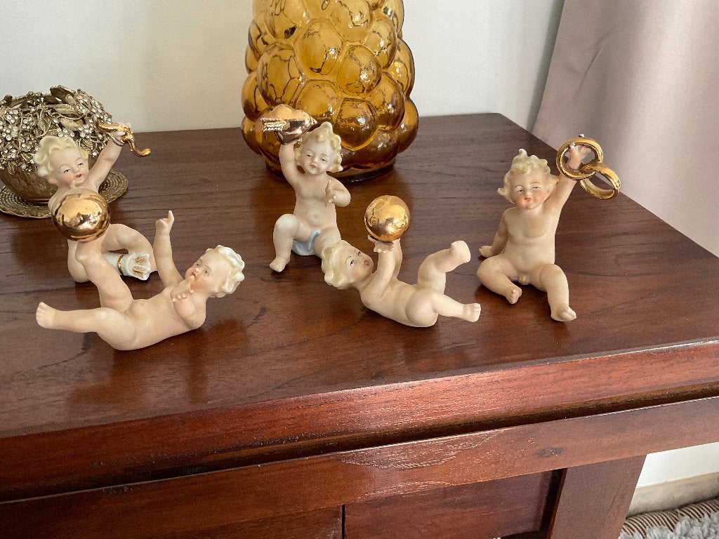 Porselein oude kindjes / putti / putto, Ophalen of Verzenden