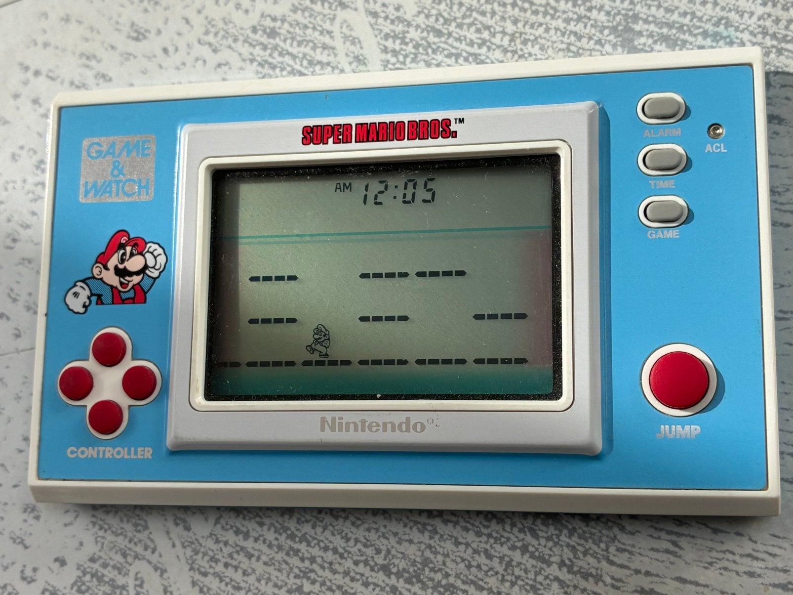 Jeu et montre Nintendo CIB Super Mario Bros. YM-105. 1988., Enlèvement ou Envoi, Comme neuf