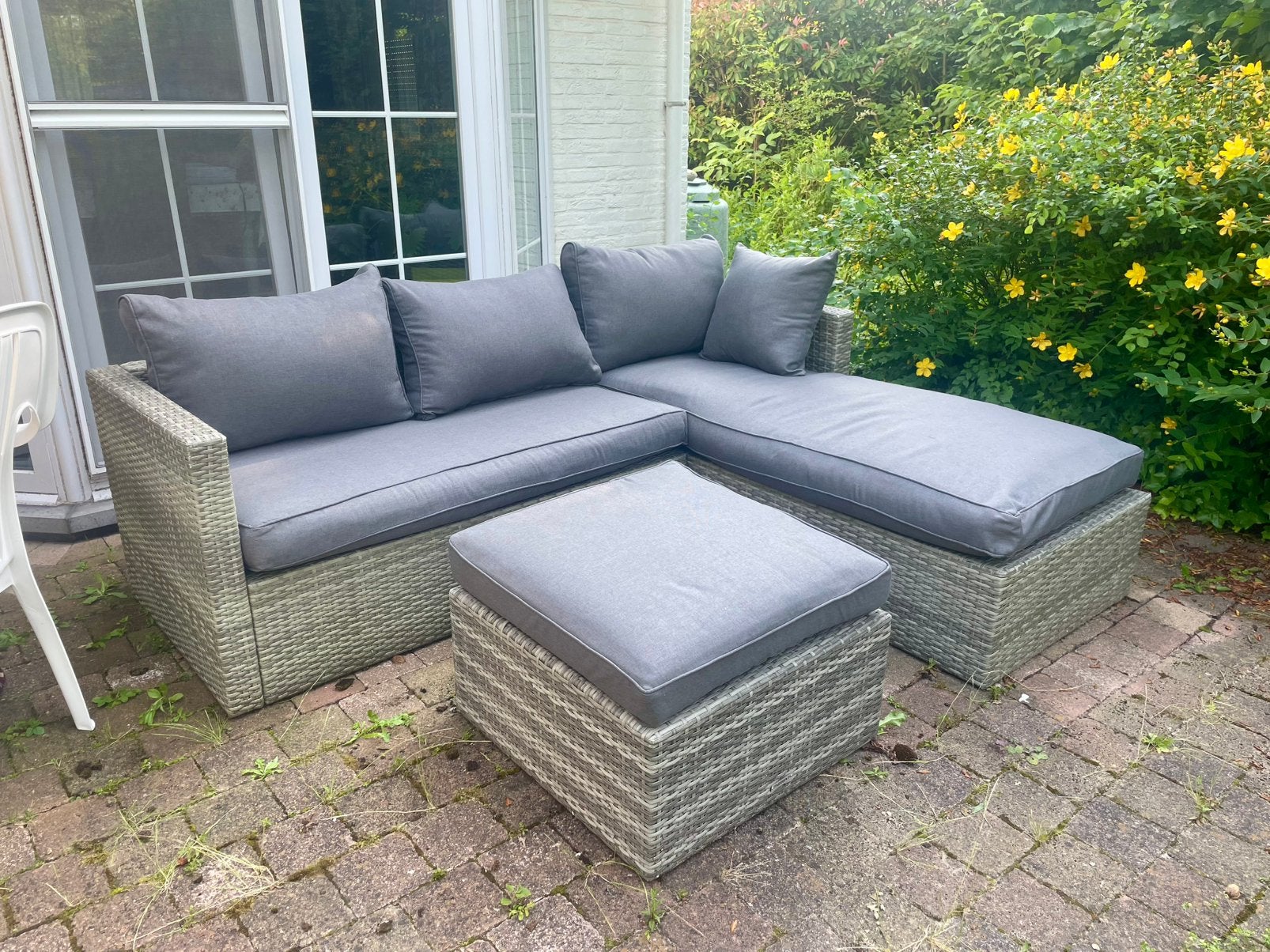 Lounge in riet en in zeer goede staat- met gratis kussens, Tuin en Terras, Tuinsets en Loungesets, Ophalen, Zo goed als nieuw