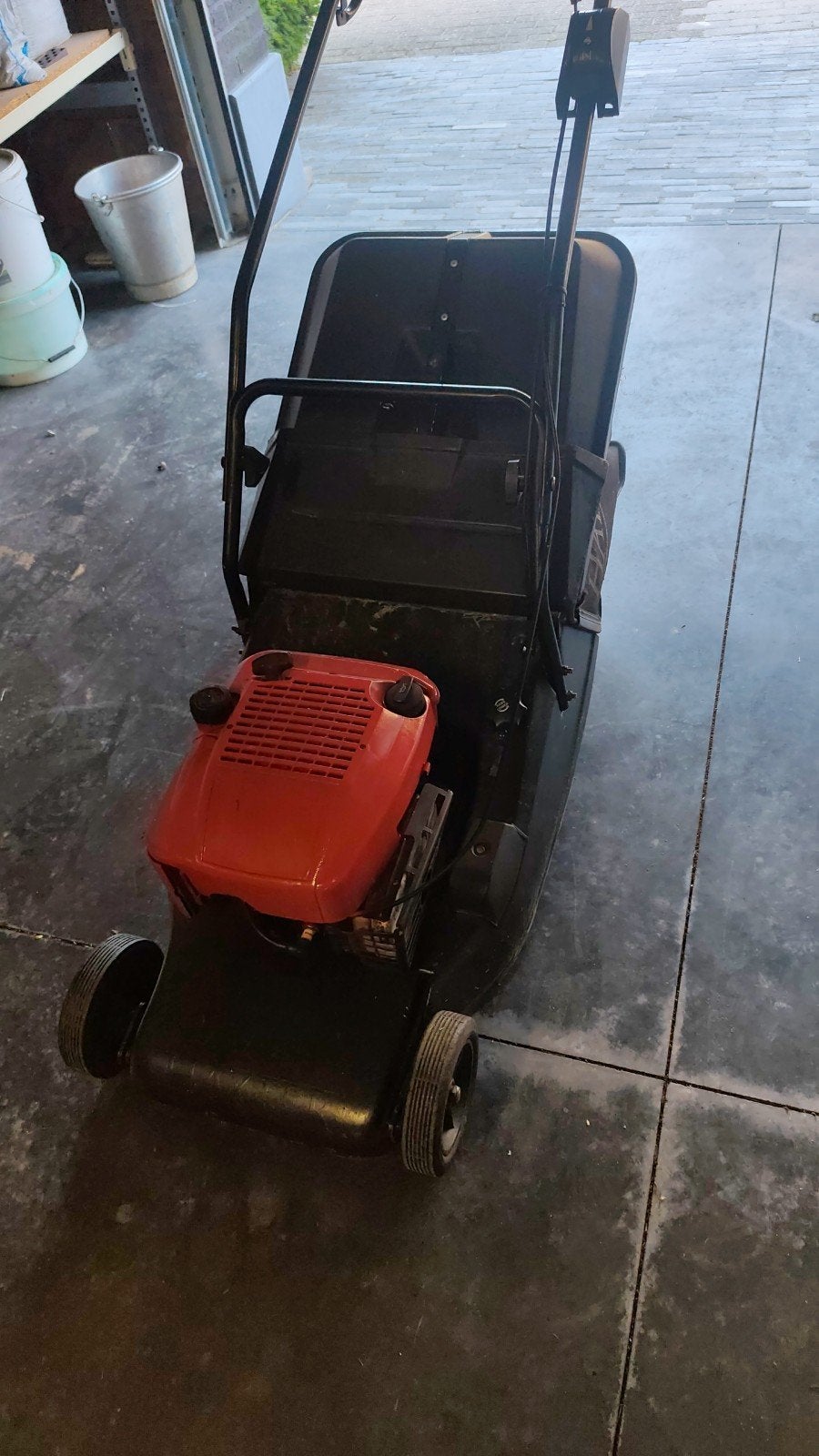 Grasmachine met rol, Ophalen