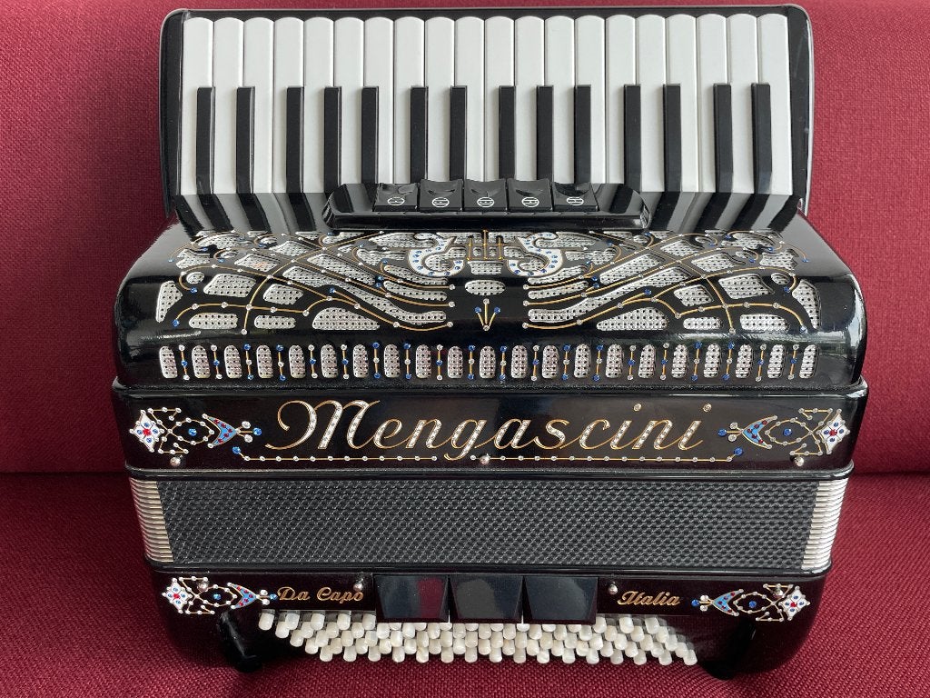 Kleine Mengascini accordeon .80 bas .Z.g.a.n.3korig musette., 80-bas, Met koffer, Zo goed als nieuw, Toetsaccordeon