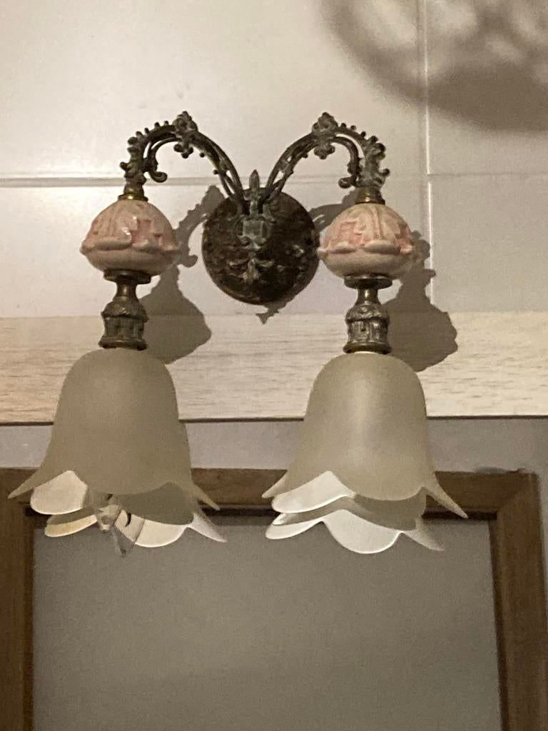 Antieke wandlamp, Enlèvement