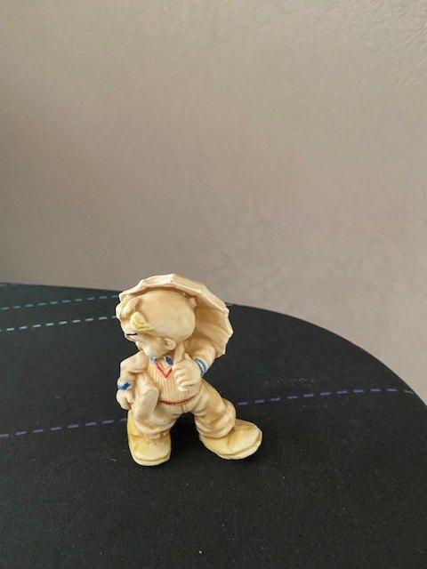 Beeldje jongetje met paraplu, Verzamelen, Ophalen
