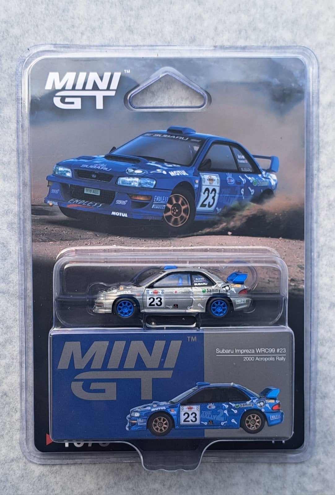 subaru Impreza wrc  (CHASSE CAR) mini gt blister, Neuf, Enlèvement ou Envoi, Voiture, Mini gt