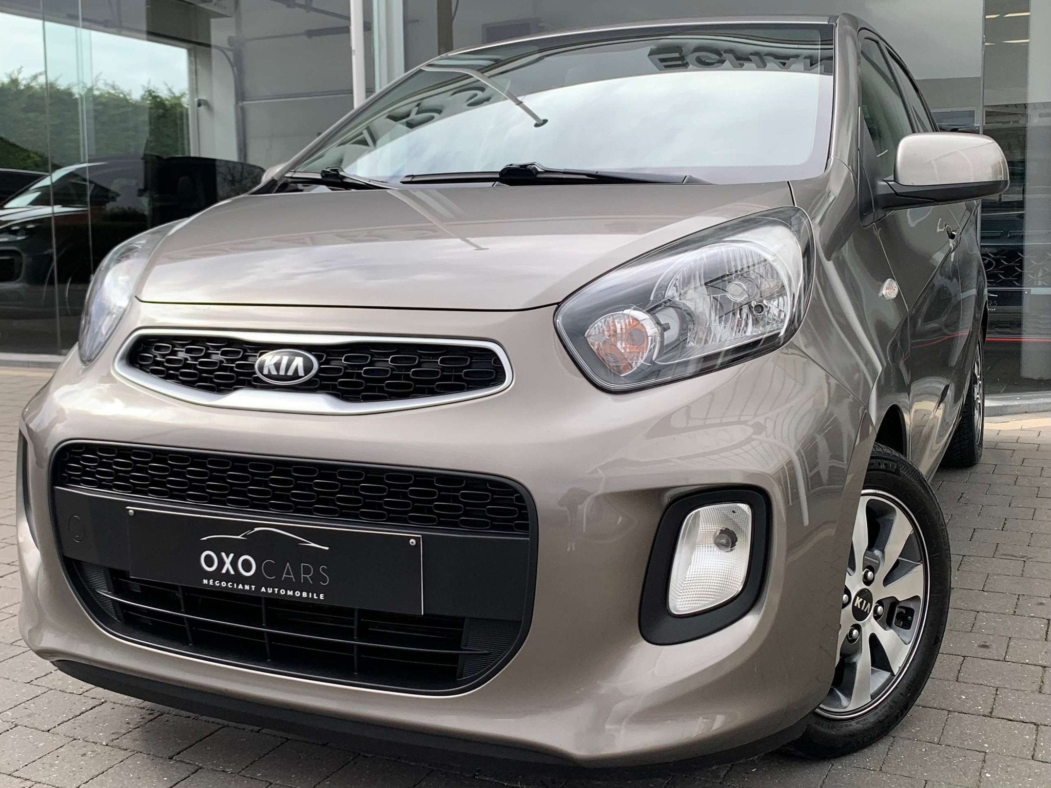 Kia Picanto 1.0i / GPS / AIRCO / CAMERA / BLUETOOTH / PDC /, Auto's, Kia, Voorwielaandrijving, Stof, Gebruikt, Euro 6