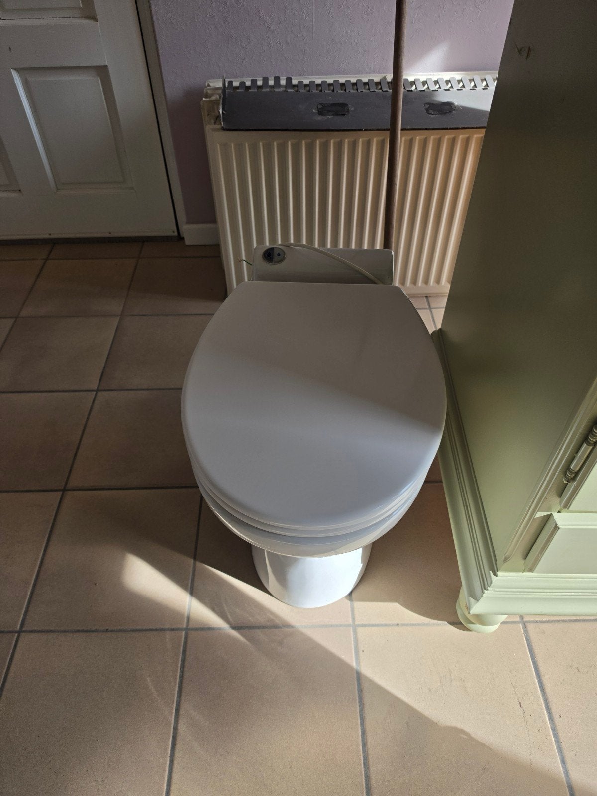 wc met vermaler, Ophalen