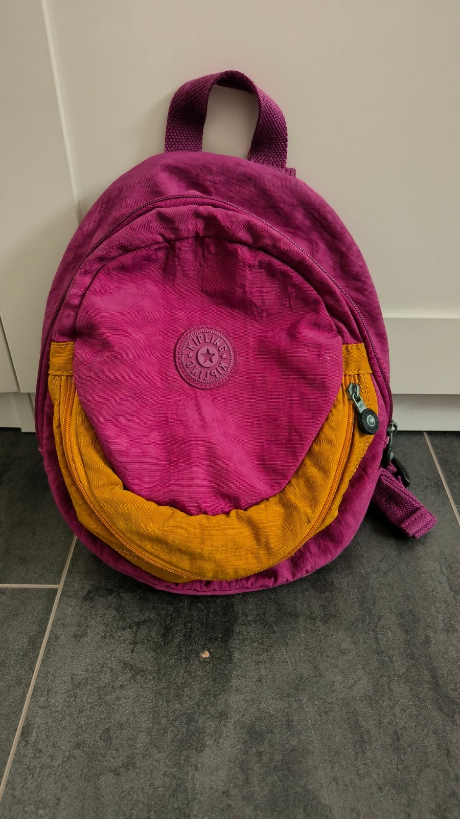 Kipling rugzak voor kleuters, Ophalen