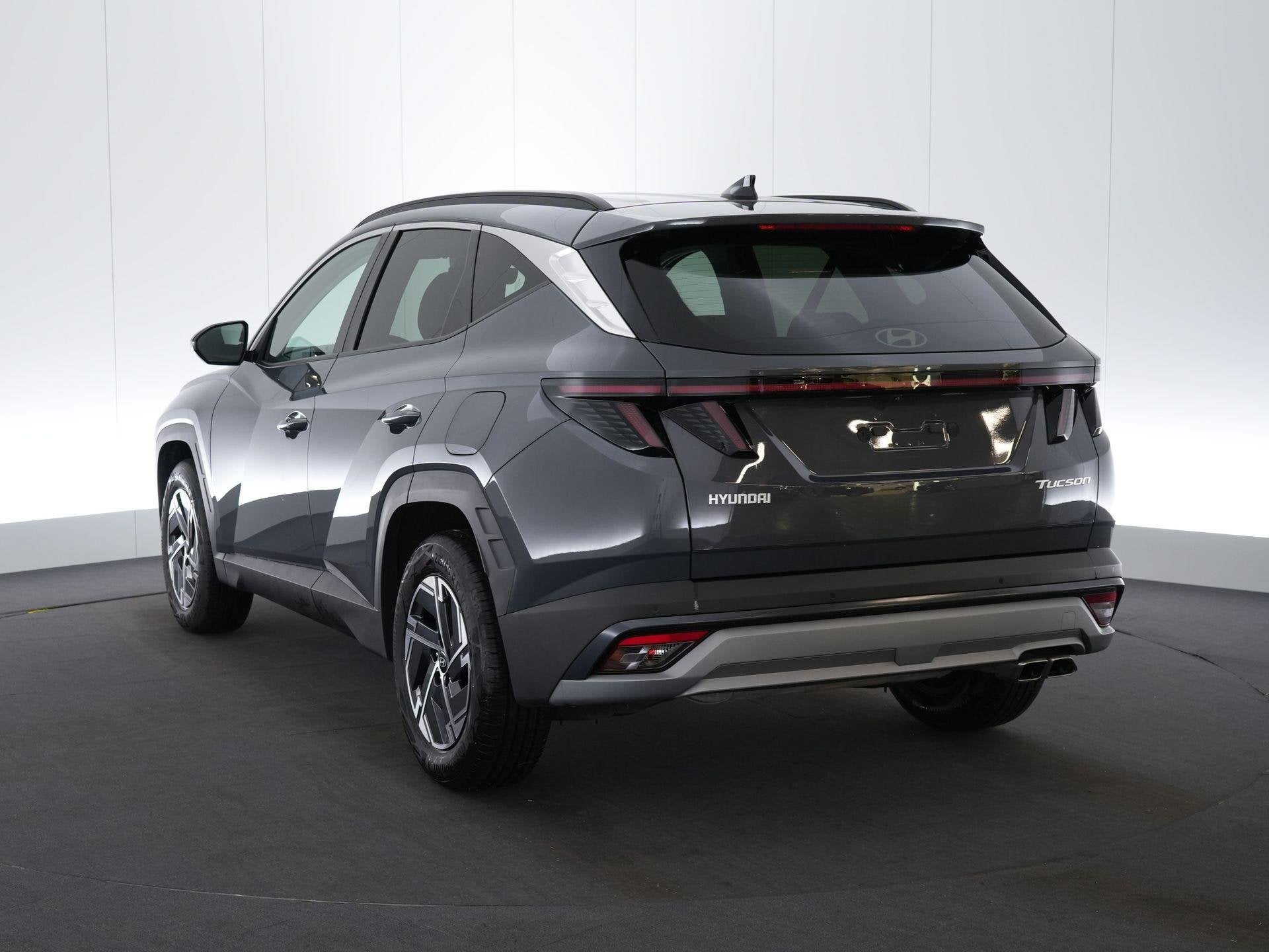 Hyundai Tucson 1.6 T-GDi 48V Feel Comfort 7-DCT, Stof, Gebruikt, 117 kW, 4 cilinders