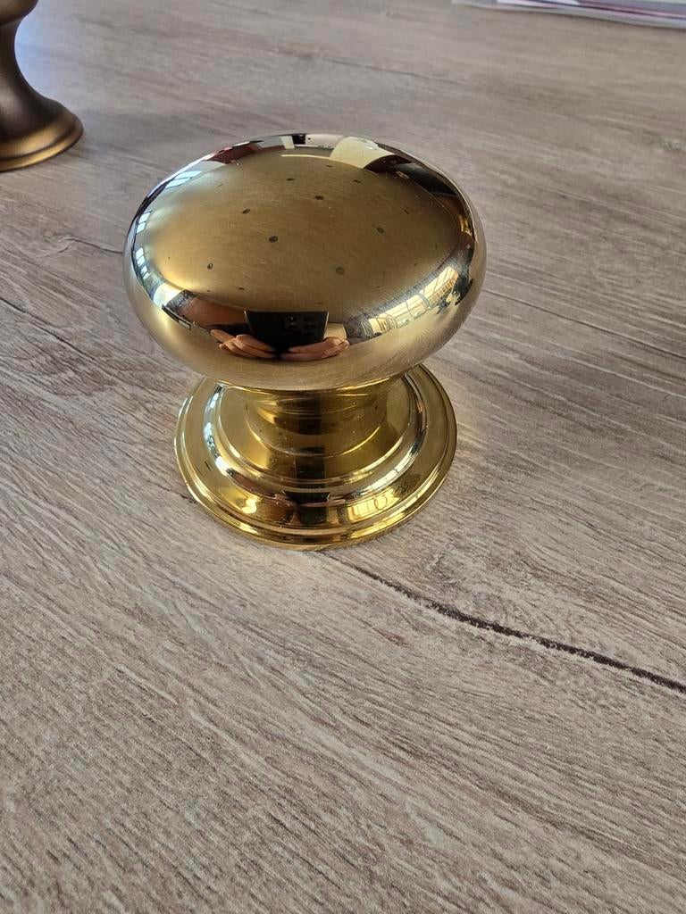 Deurtrekker knop, Ophalen