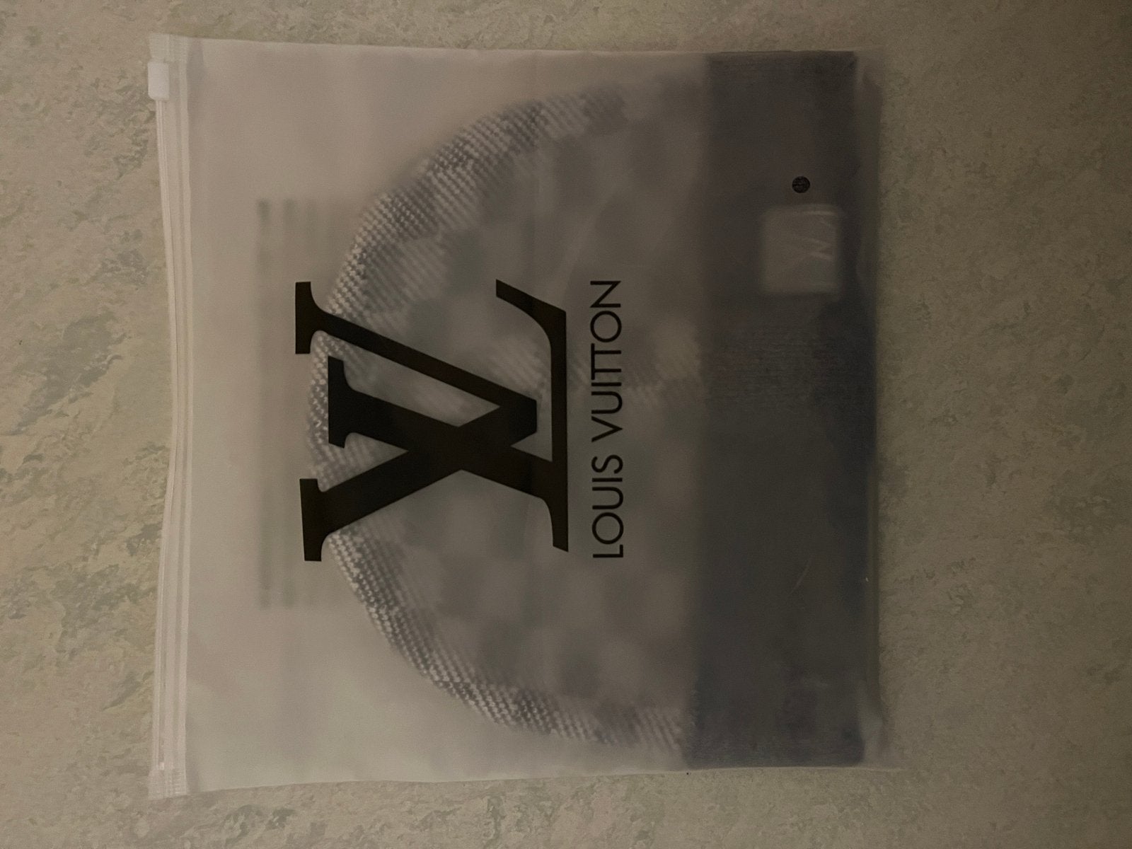 Louis vuitton muts, Ophalen