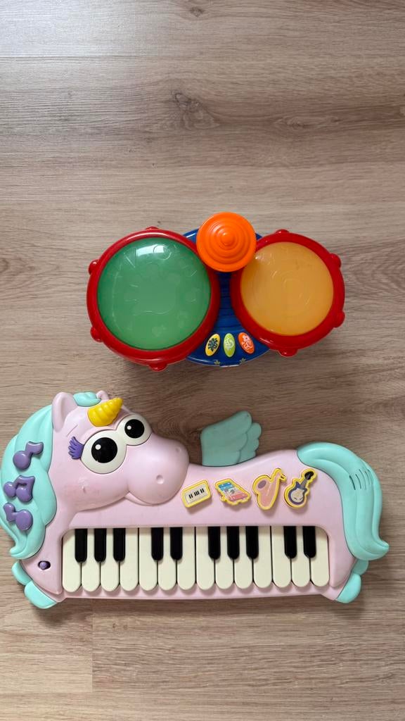 Speelgoedtrommel en speelgoedpiano unicorn., Ophalen of Verzenden, Zo goed als nieuw