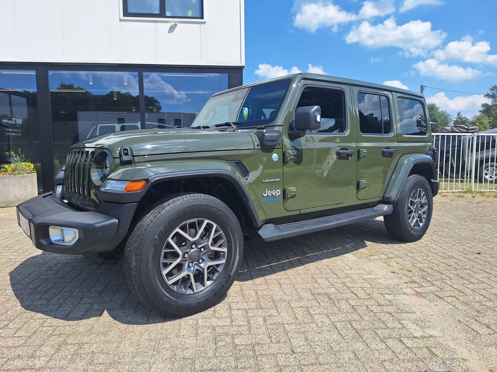 Jeep Wrangler 4xe hybride Sarge Green, Auto's, Jeep, Automaat, 4 deurs, Leder, Hybride Elektrisch/Benzine