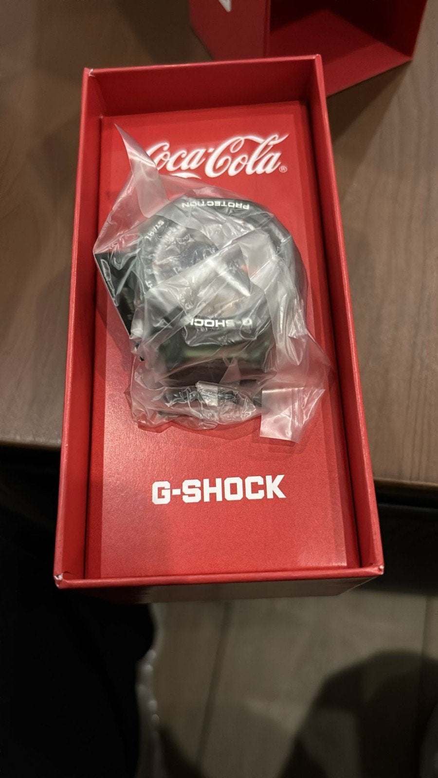 Casio G-SHOCK Coca-Cola 140e verjaardag, Ophalen, Casio