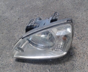 Optique avant gauche Kia Carens 2 2002-2006 LP/15617, Ophalen, Gebruikt, Kia