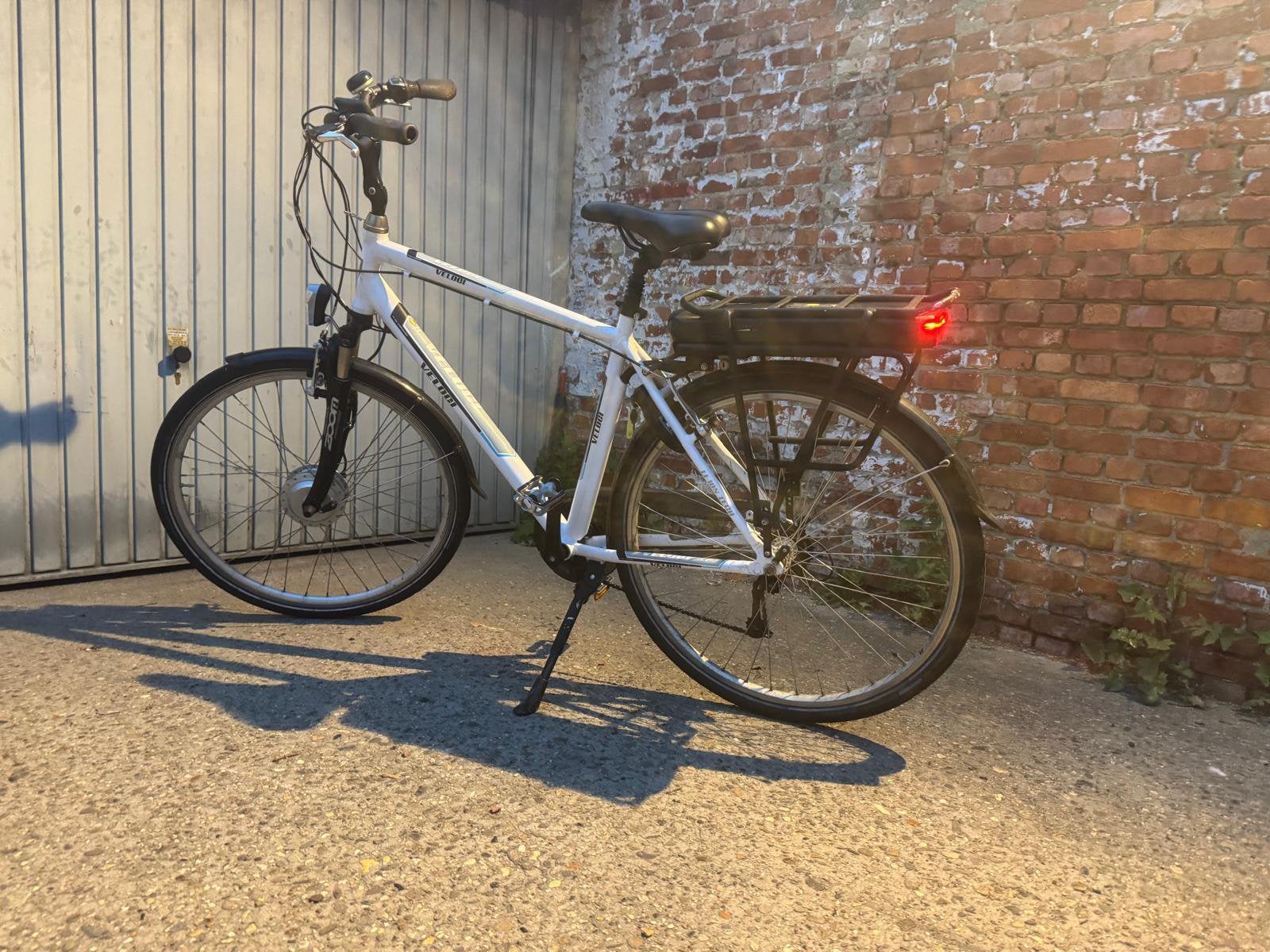 VÉLO ÉLECTRIQUE VELOCI AVEC MOTEUR AVANT, Enlèvement, Comme neuf