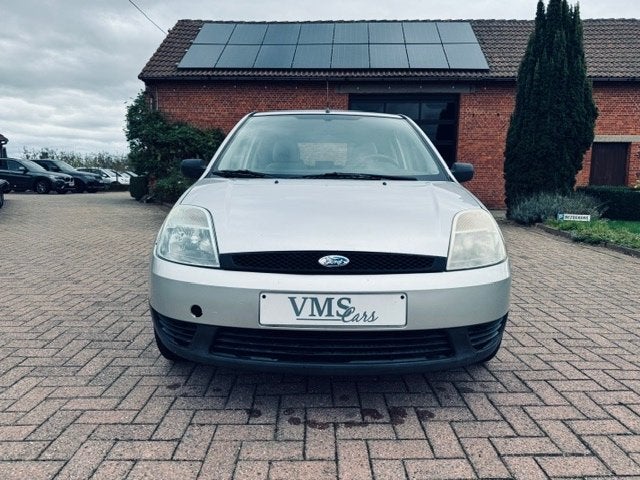 Ford Fiesta 1.25 Benzine * Garantie *, Auto's, Stof, 1242 cc, 4 cilinders, Grijs