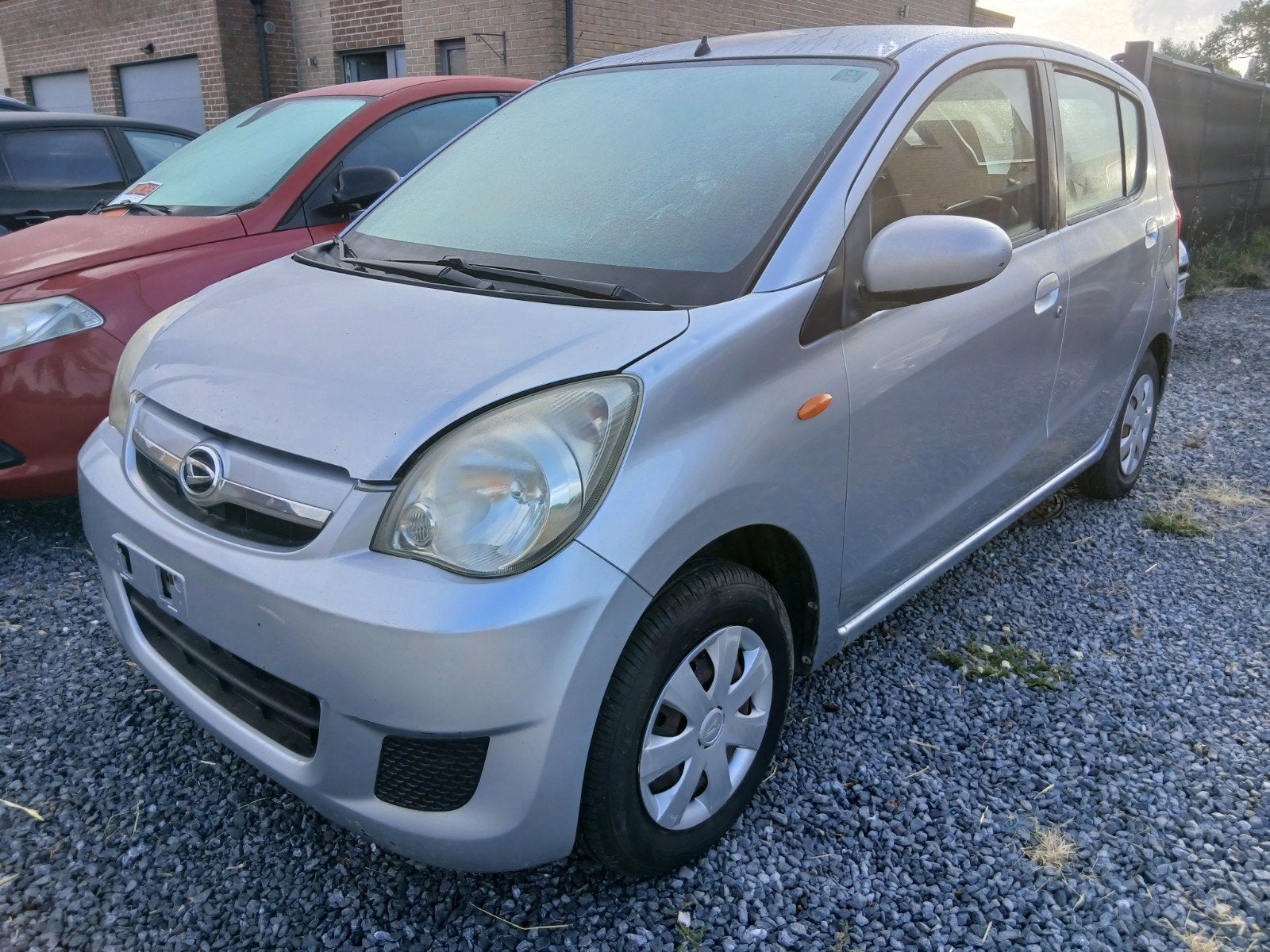Daithatsu cuore 1000 cc 51 kws euro 4 5 portes airco vitres, Auto's, Daihatsu, Voorwielaandrijving, Stof, Cuore, 5 deurs