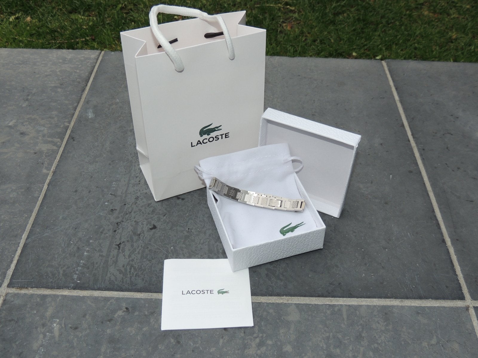 Bracelet Lacoste en acier inoxydable, Bijoux, Sacs & Beauté, Bracelets, Enlèvement ou Envoi, Neuf, Argent, Acier