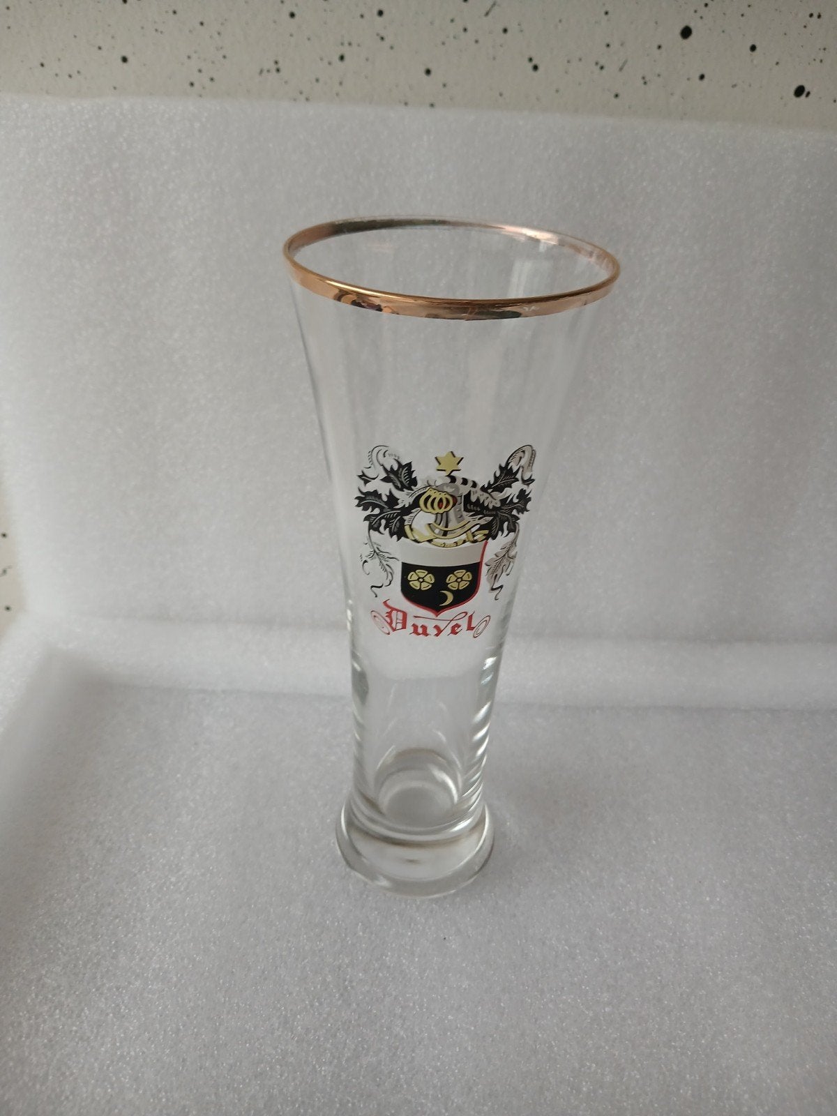 Vintage Duvel fluitglas met wapenschild en goudrand, Enlèvement ou Envoi, Comme neuf, Verre à bière