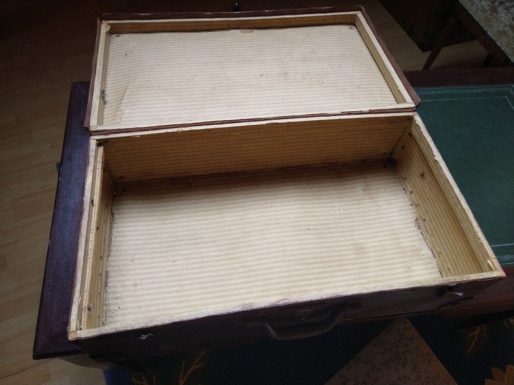 Vintage reiskoffer, Ophalen