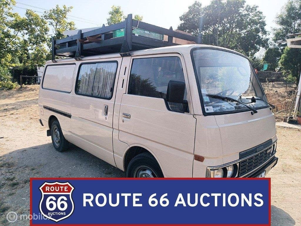 Nissan Urvan E23 | 1986 | Route 66 Auctions, Auto's, Zwart, Bedrijf, Handgeschakeld, Overige carrosserie