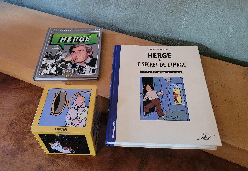 2 boeken +blikken doos Hergé, Ophalen of Verzenden, Zo goed als nieuw