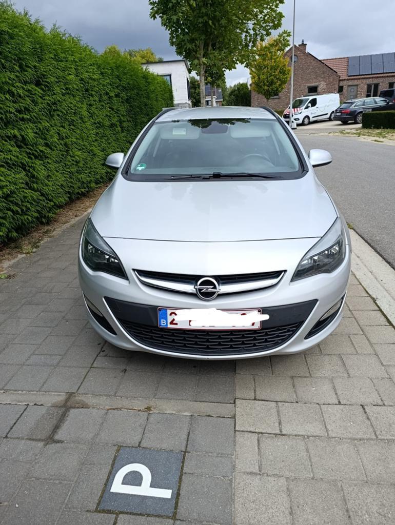 Opel Astra Sports Tourer 1.6 diesel euro 6 2014, Auto's, Voorwielaandrijving, 4 cilinders, 1600 cc, Leder en Stof
