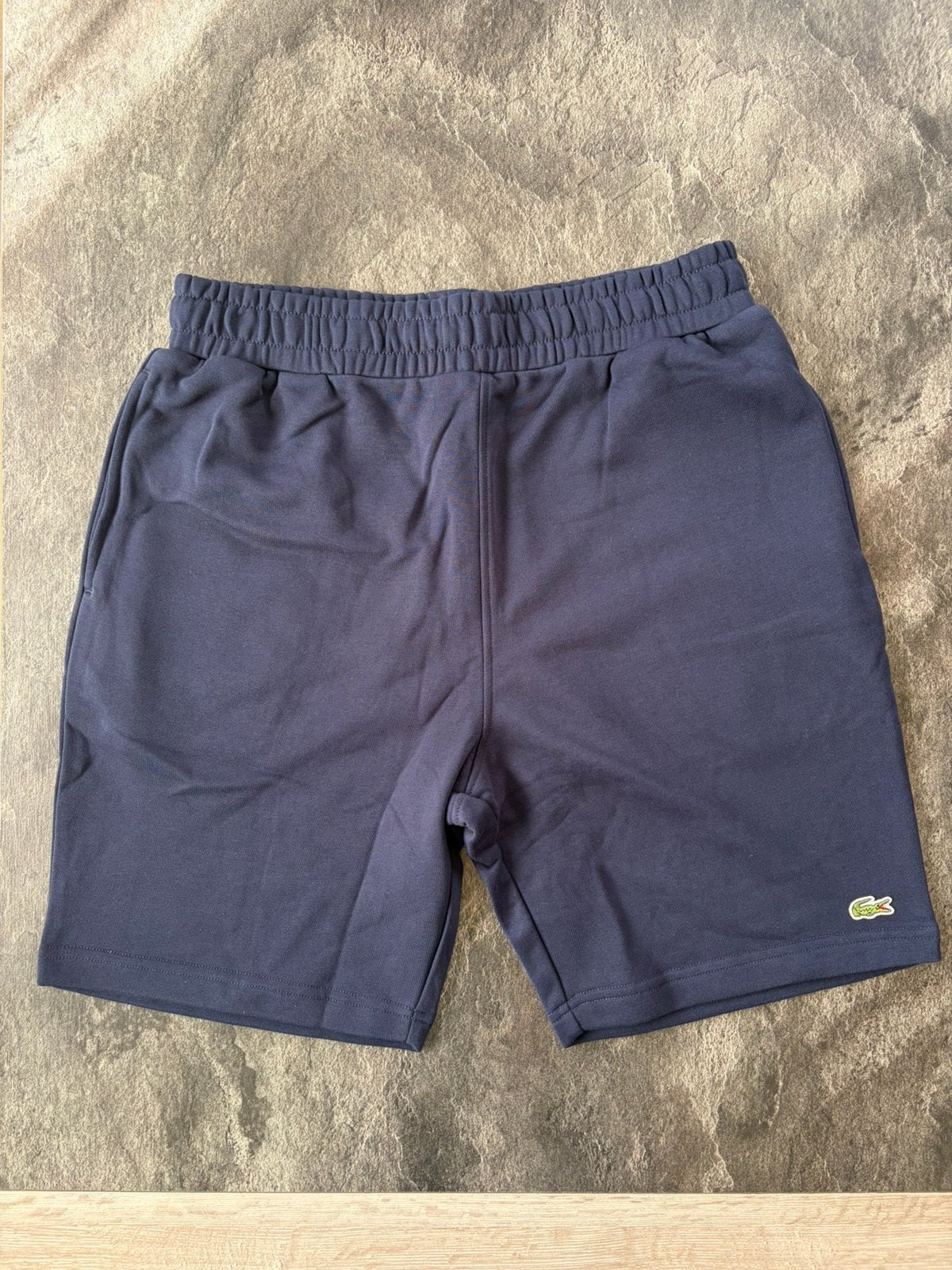 Lacoste blauwe korte broek maat L, Ophalen, Zo goed als nieuw, Blauw