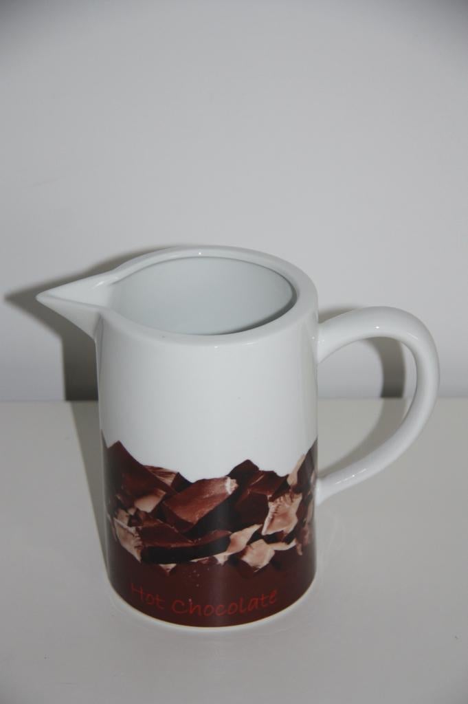 Asa selection hot choco bruin witte melk kan, Ophalen of Verzenden, Gebruikt, Keramiek, Kop(pen) en/of Schotel(s)