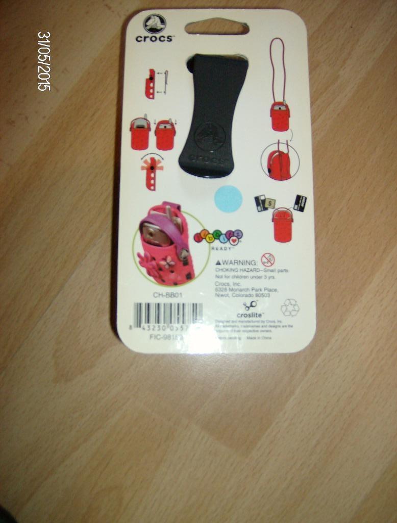 crocs o-dial - gsm houder - nieuw Deze o-dial case is ontwor, Enlèvement ou Envoi, Neuf, Housse ou Sac