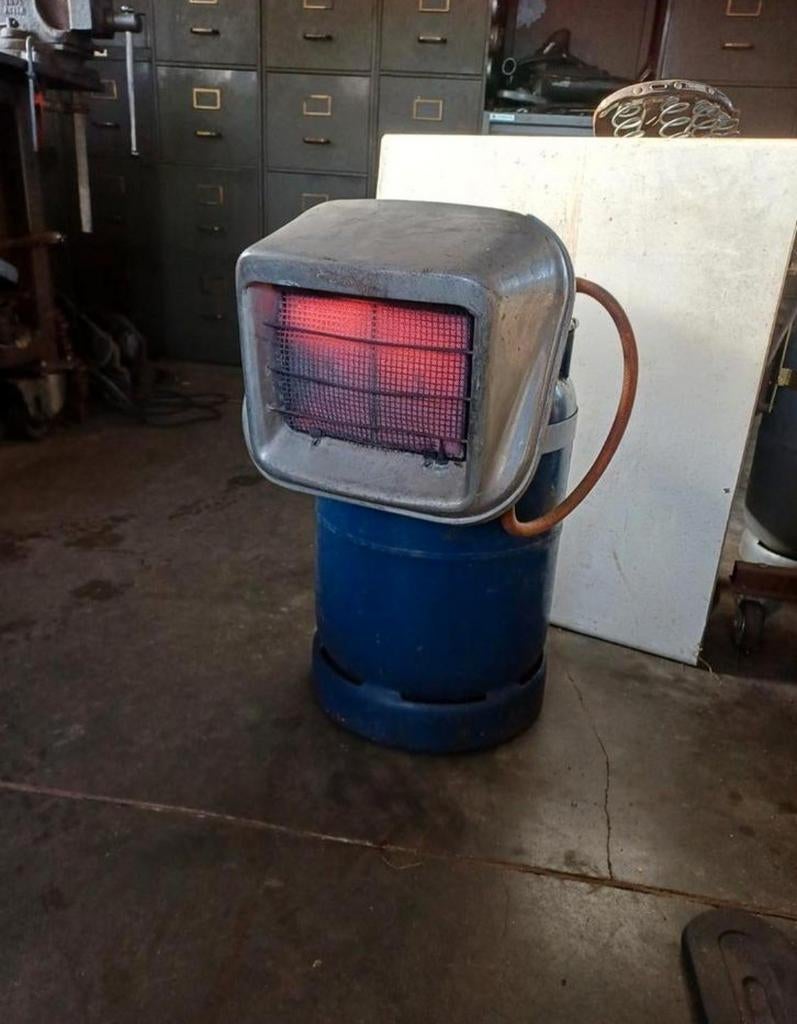 Chauffage à Gaz d'atelier.
Bonbonne pleine, Enlèvement