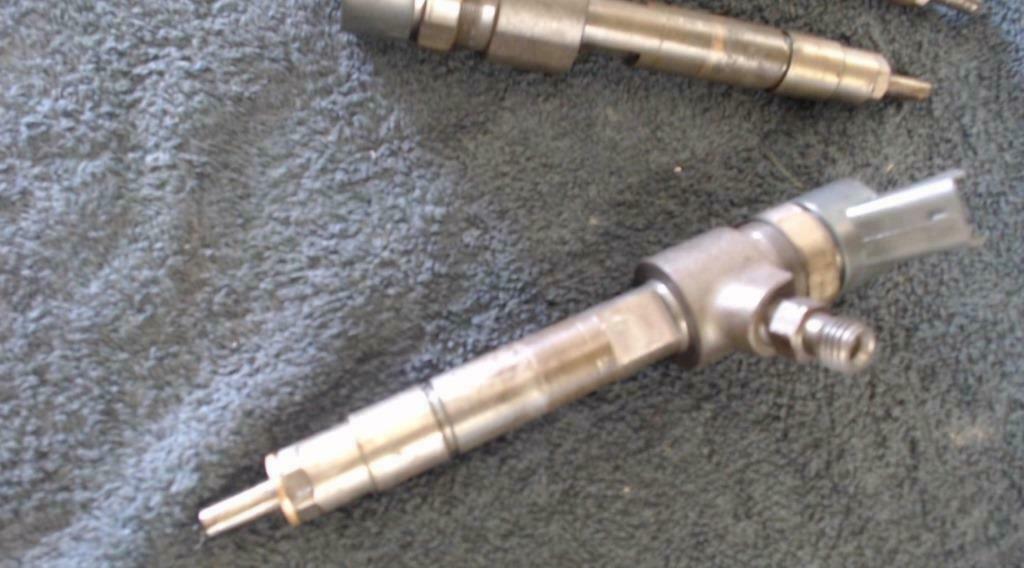 injecteur  opel  0445 110 168, Enlèvement ou Envoi, Opel