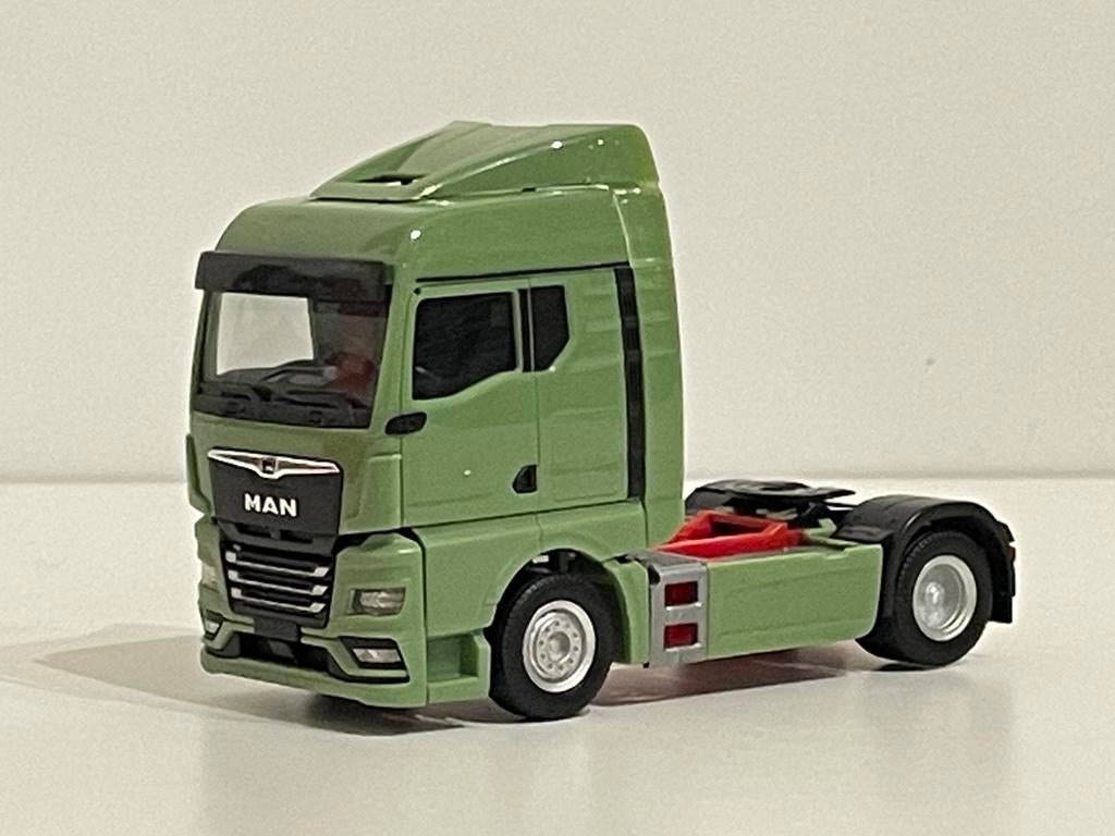 Herpa MAN TGX GM trekker groen 1/87, Ophalen of Verzenden, Zo goed als nieuw, Herpa