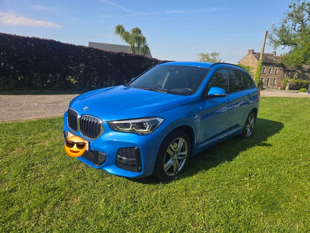 BMW X1 25E X Drive - HYBRID - Blauw - 220 pk, Auto's, 42 g/km, Blauw, Leder, 5 zetels