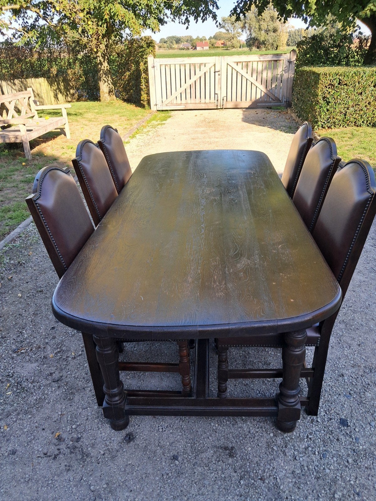 eiken tafel en 6 stoelen met leder bekleding., Huis en Inrichting, Ophalen, Gebruikt, 4 tot 6 stoelen