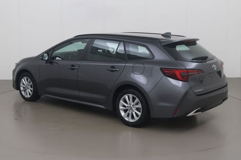 Toyota Corolla SW Hybrid (HEV) 1.8 dynamic e-cvt gpf 140 AT, Auto's, Automaat, Gebruikt, Zwart, 4 cilinders