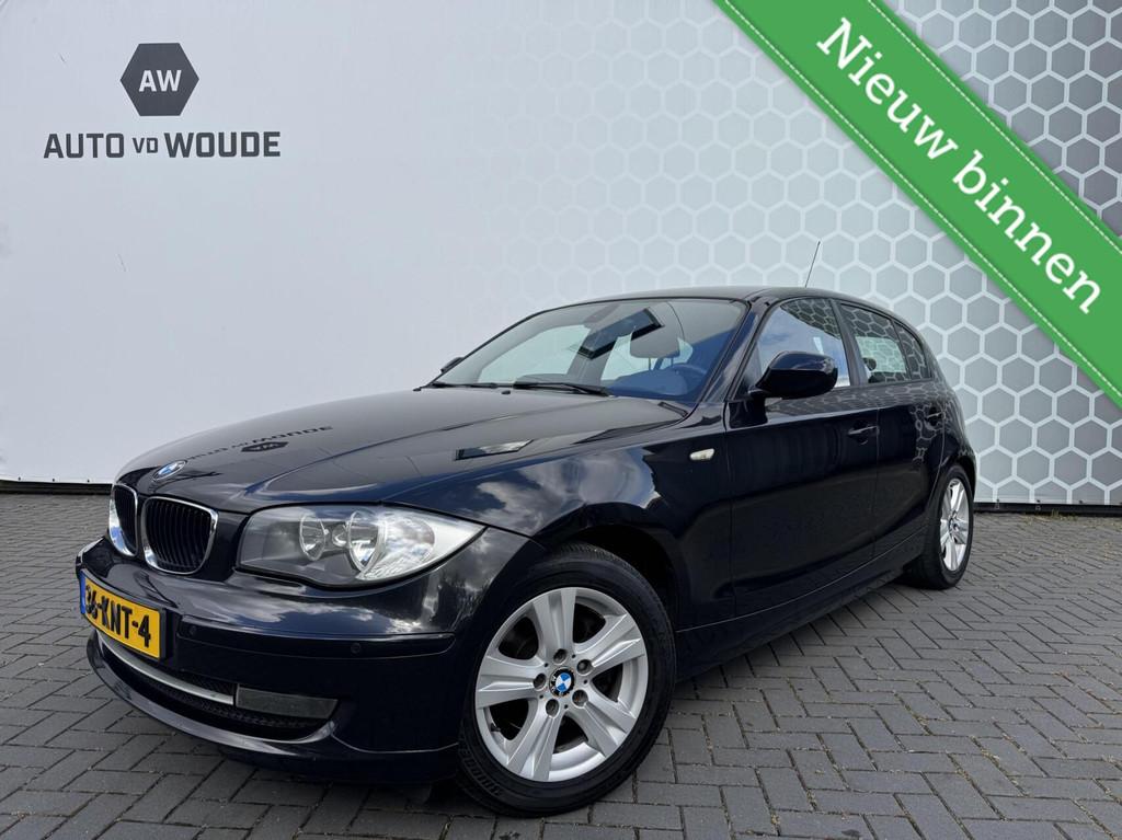 BMW 1-serie 120i 170PK 5 deurs afneembare Trekhaak Bluetooth, Auto's, BMW, Euro 5, 4 cilinders, Zwart, 5 deurs