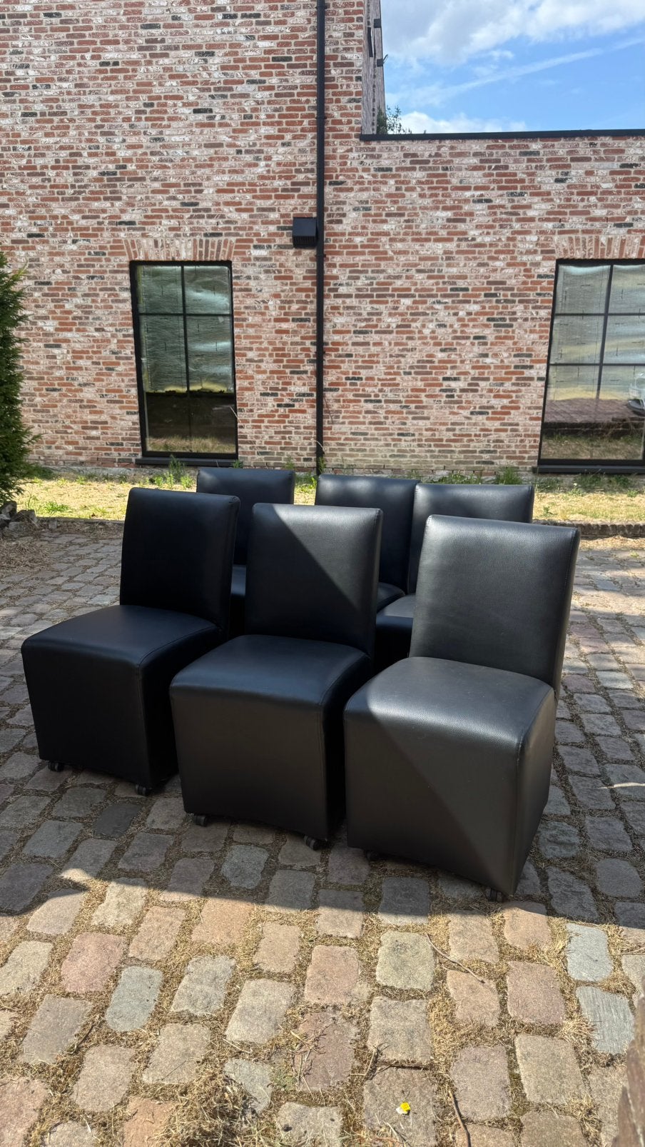 6 eetkamerstoelen met wieltjes in zwart leder, Huis en Inrichting, Stoelen, Ophalen, Gebruikt, Zwart, Leer