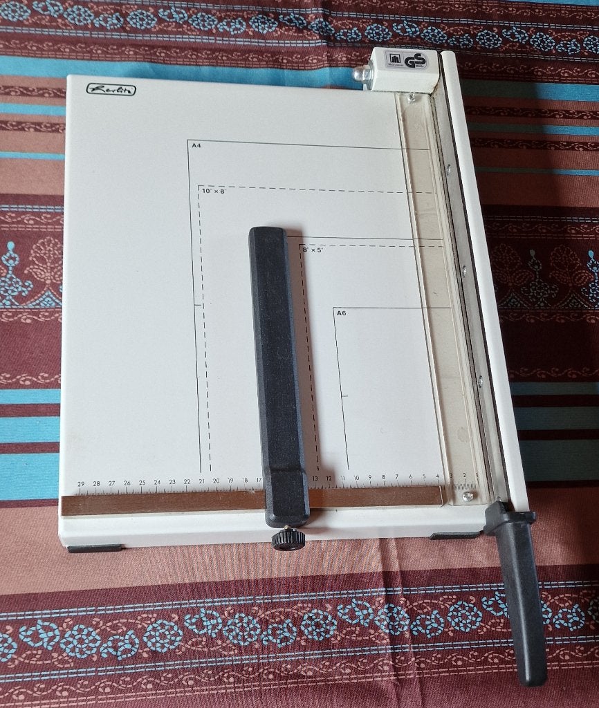 papiersnijder, Ophalen, Gebruikt